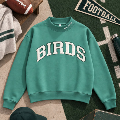 Birds Varsity Mockneck in Green, color-corrected product view