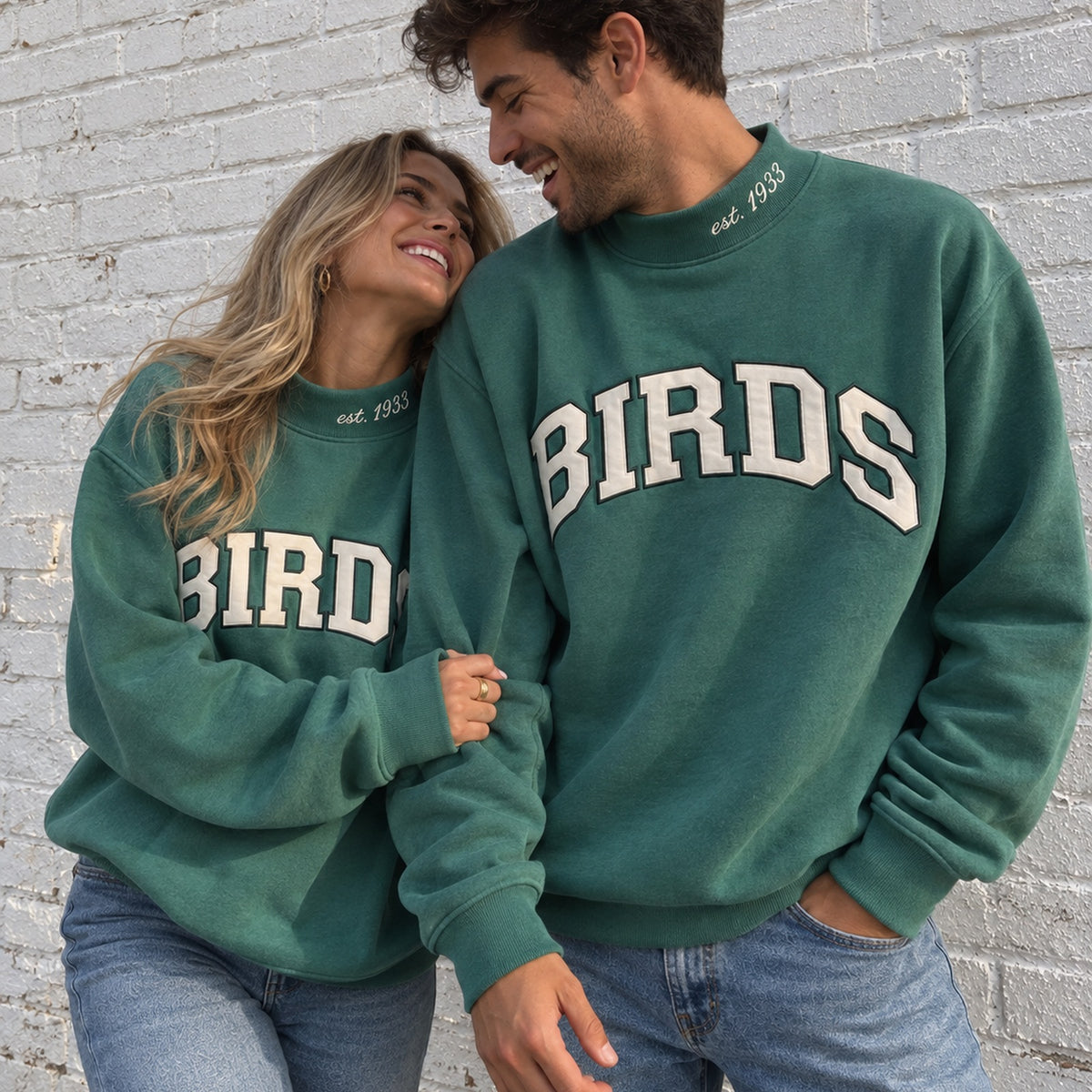 Couple wearing the Green Birds Varsity Mockneck